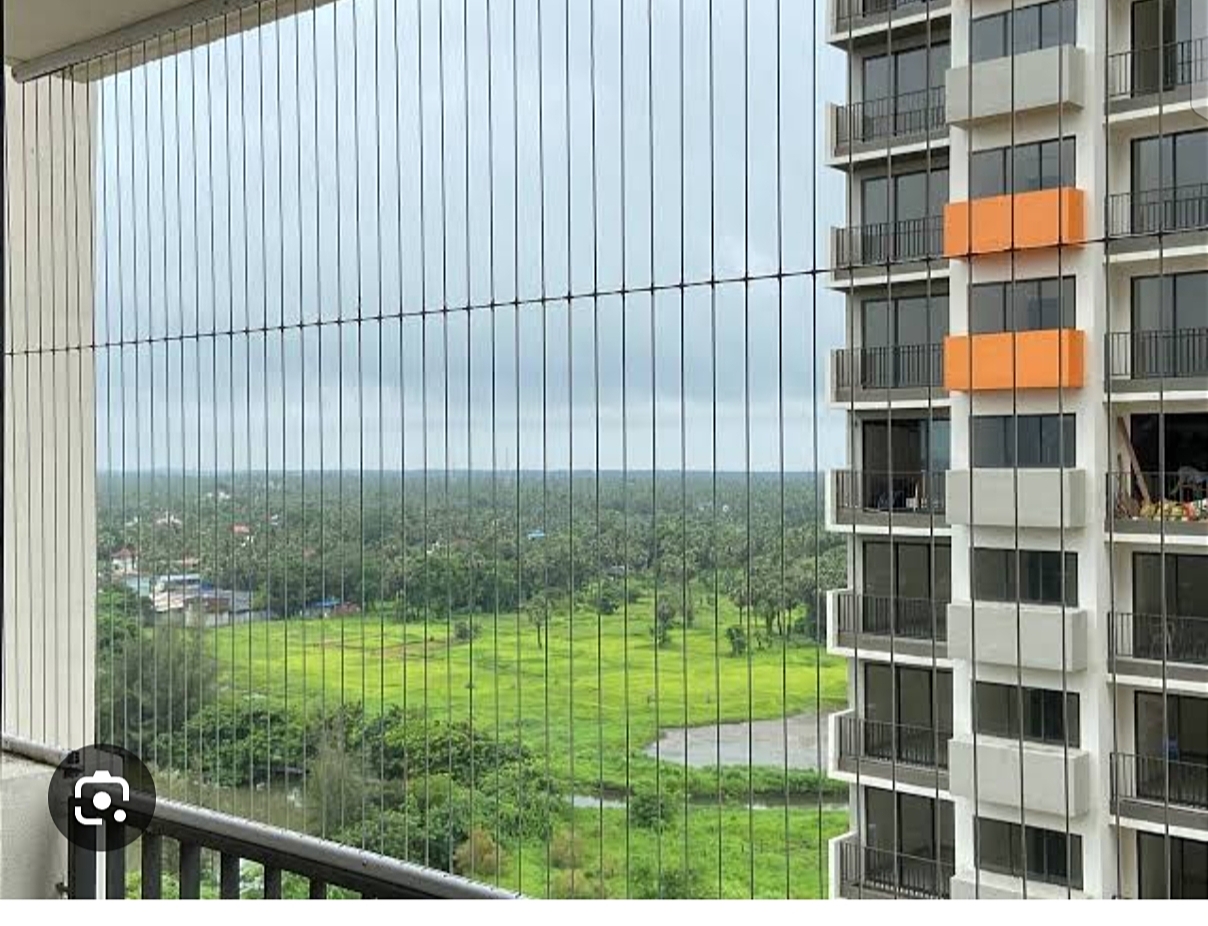 Invisible grill installed on balcony in Gurugram